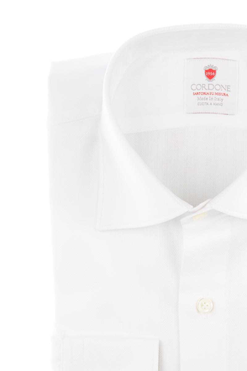 Spina White  by Hand